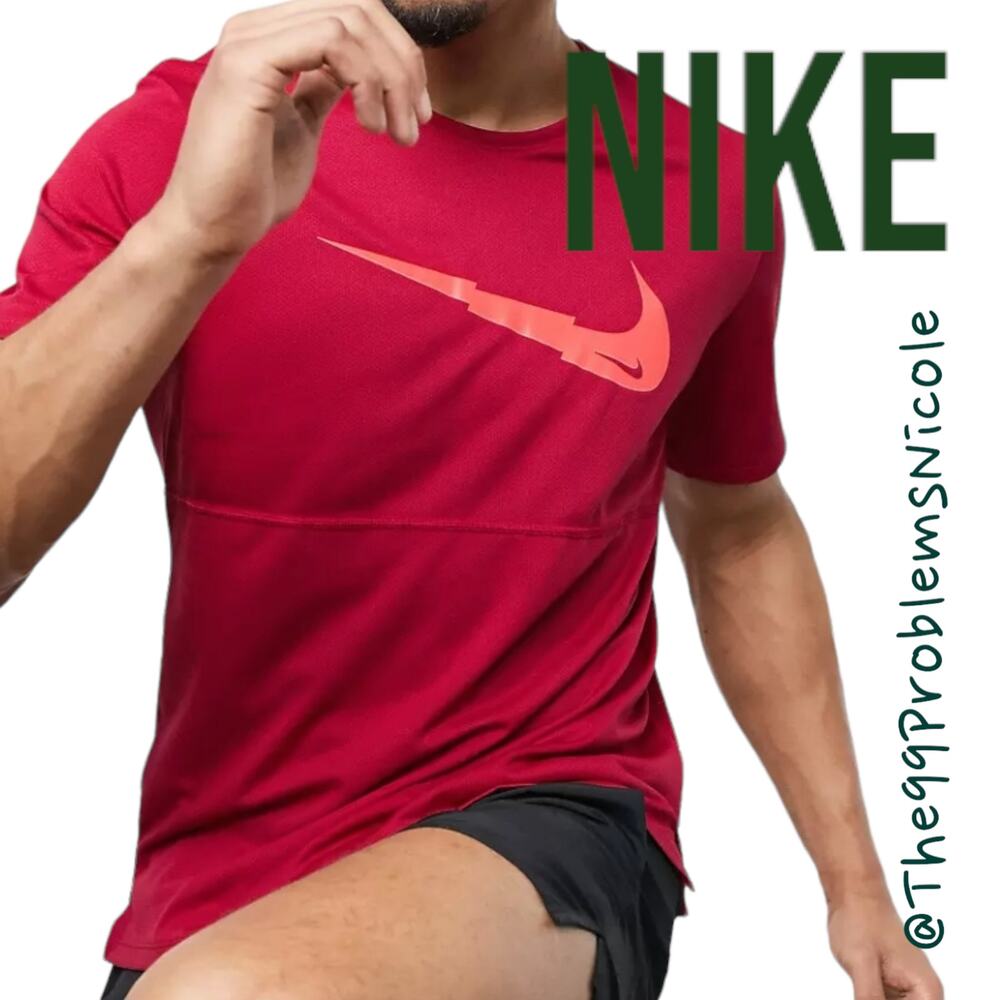 Red Nike Dri-Fit shirt
